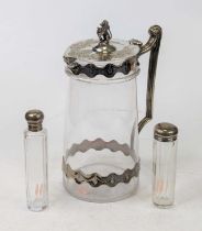 An Edwardian glass claret jug, having silver plated mounts with scrolled acanthus leaf handle, the