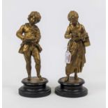 A pair of 19th century French gilt spelter figures of children, each upon an ebonised socle base,