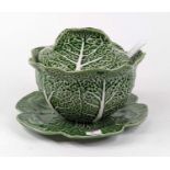 A Portugese pottery tureen cover, in the form of a cabbage, height 19cm, together with a matching