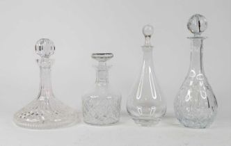 A cut glass ship's decanter and stopper, height 25cm, together with a mallet shaped decanter and two