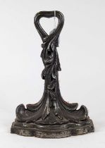 *A cast metal doorstop in the form of acanthus leaves, height 36cm