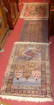 An Afghan bright coloured woollen war rug, 134 x 88cm; together with a Persian prayer rug, 128 x