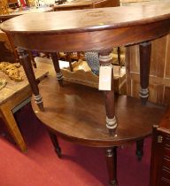 A pair of early Victorian mahogany D-end side tables, each raised on turned and slightly tapering