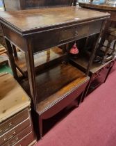 A George III mahogany fold-over tea table, having rear gateleg action and single frieze drawer, on