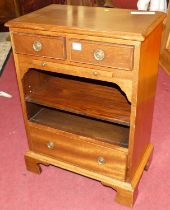 A small mahogany side table, fitted with twin short drawers, slide, single lower drawer, and open