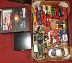 A box containing loose playworn and boxed modern issue diecast including Matchbox Models of