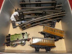 An 0 gauge clockwork Hornby Meccano 101 locomotive, and other accessories