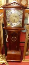 *A contemporary hardwood cased grand-daughter clock, the silvered and brass dial signed Stephen