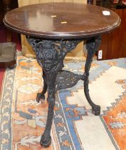 A pierced cast iron based and beech topped circular pub table, dia. 59.5cm