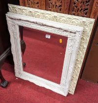 Two contemporary French style white painted floral decorated rectangular wall mirrors