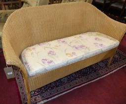 A contemporary Lloyd Loom wicker conservatory suite, comprising; two seater sofa, pair of tub