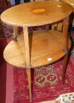 An Edwardian mahogany and satinwood inlaid oval two-tier occasional table, w.63cm