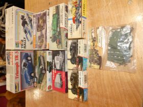 A quantity of kit related models to include Matchbox Morris C8MK2, Revell TR8 Rally, etc