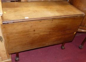 An early 19th century mahogany dropleaf dining table, raised on claw and ball feet, w.97.5cm