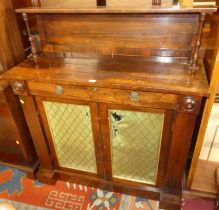 A George IV rosewood chiffonier, having a raised superstructure over single frieze drawer, to