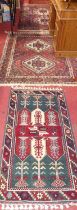 *Two similar Persian woollen blue, red and cream ground Qashqai rugs, each approx 180 x 140cm;