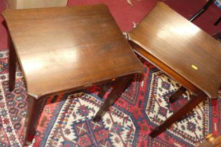 A pair of reproduction mahogany square low occasional tables, on chamfered moulded supports, w.46.