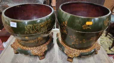 A near pair of Chinese green lacquered and gilt decorated planters, each of shouldered tapering