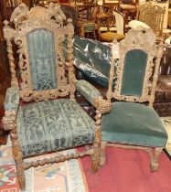A set of four late 19th century carved limed oak dining chairs, in the Carolean taste, each having