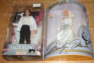 A boxed Marilyn Monroe collectors series Silver Sizzle Marilyn figure, and a boxed Michael Jackson