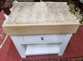 A brand new Neptune Chichester chopping block, the blond oak removable block raised on white painted