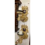 *A pair of decorative Continental painted wood candle wall sconces, each with crown, shield and