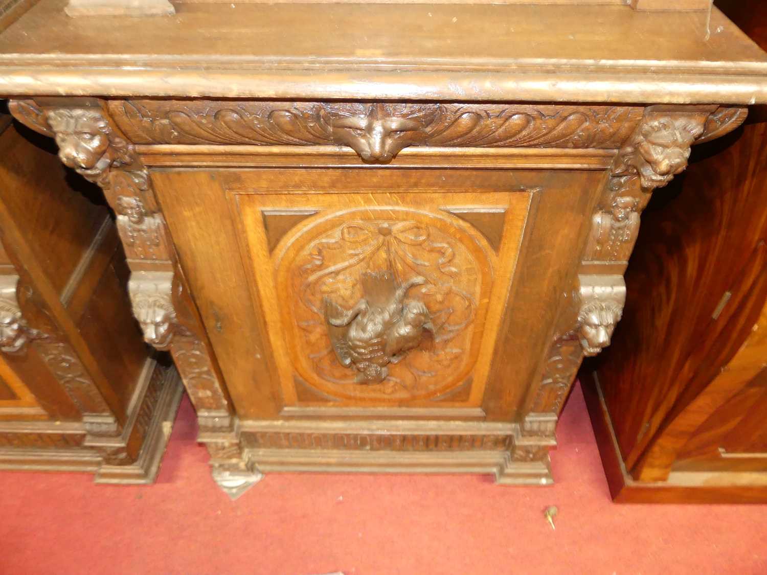 A pair of circa 1900 heavily carved Flemish oak parlour bookcases, each with single glazed upper - Image 2 of 10