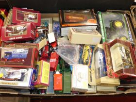 A box containing loose and boxed modern issue diecast to include Matchbox Models of Yesteryear,