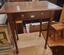 A 19th century provincial round cornered single drawer side table, raised on turned supports to