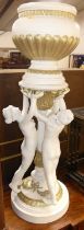 A contemporary classical style white painted and gilt decorated composite bulbous jardiniere on