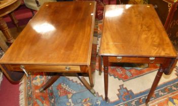 A Regency mahogany dropleaf pedestal support table, having opposing end frieze drawers, raised on