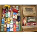 Three boxes containing loose playworn diecast and double deck tram car kits Together with railway