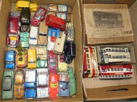 Three boxes containing loose playworn diecast and double deck tram car kits Together with railway