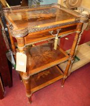 *A walnut, satinwood and further inlaid three-tier whatnot, having a pierced brass upper gallery and