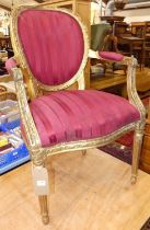 *A French Louis XVI style floral giltwood framed tub fauteuil, having silk damask uphostered pad