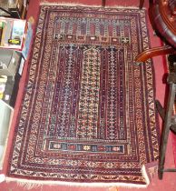 A Persian woollen brown ground prayer rug, 145 x 95cm; together with a Persian woollen blue and