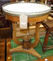 A 19th century French walnut and white marble topped circular occasional table, having a pierced