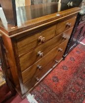 A mid-Victorian mahogany square front chest of two short over three long graduated drawers, with