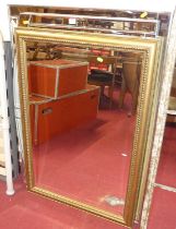 Three various contemporary bevelled wall mirrors, the largest 113 x 81.5cm