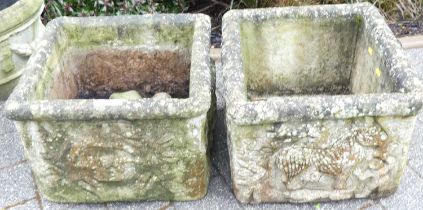 A pair of moulded concrete square section planters, raised on loose feet, width 49, depth 46cm