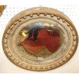 A circa 1900 gilt wood circular convex wall mirror in the Regency taste, dia. 44.5cm