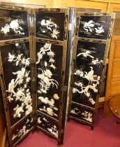 A contemporary Japanese black lacquered gilt decorated and composite inset four-fold screen,