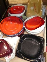 Three fruit trays containing a large quantity of advertising ashtrays by various distilleries to