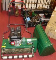 A Masport Olympic petrol driven Reel mower, with grass collecting box
