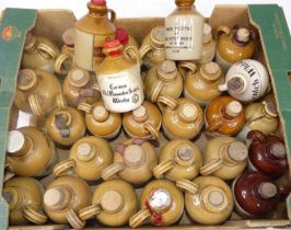 A collection of stoneware miniature whisky flagons (lacking contents to include Glenfairn, Auld Lang