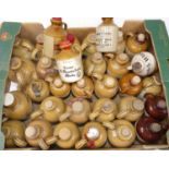 A collection of stoneware miniature whisky flagons (lacking contents to include Glenfairn, Auld Lang