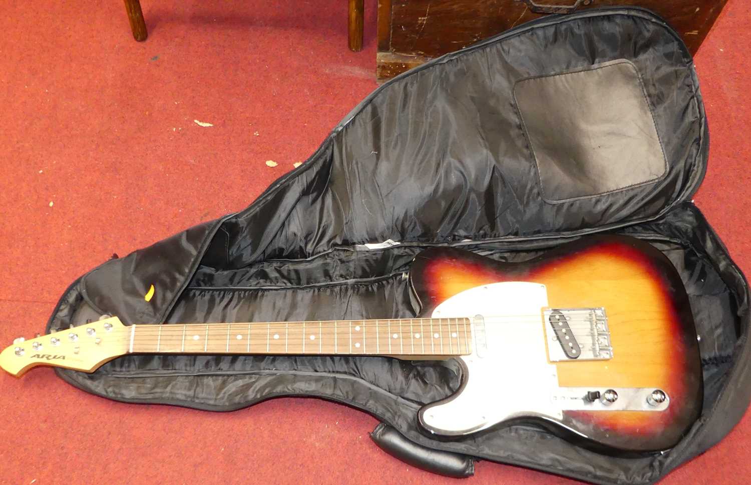 An Aria STG-Series electric guitar, with canvas bag (2)