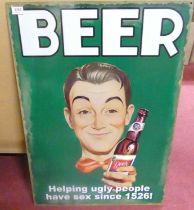 A contemporary laminate on metal wall sign 'Beer - helping ugly people have sex since 1526', 70 x