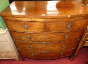 A Regency mahogany bow front chest of two short over three long drawers, width 101.5cm Height 104cm,