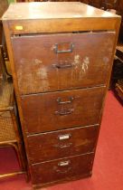 A 1930s stained plywood four drawer office filing chest, width 51cm